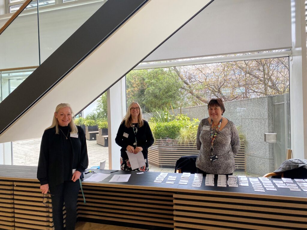 The IBME admin team working at the BioEngenuity Event in November 2024.